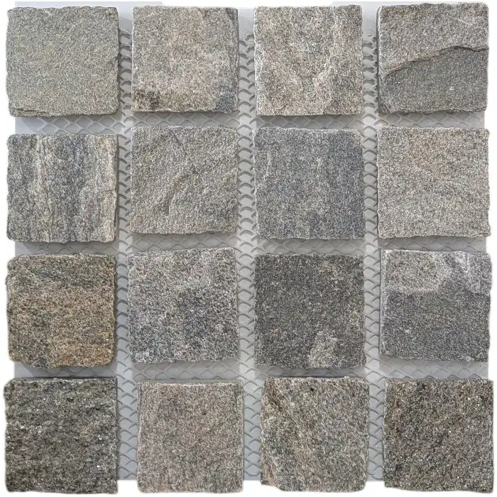 Ocean Quartz cobblestone driveway featuring blended grey and gold natural stone tones with textured organic finish