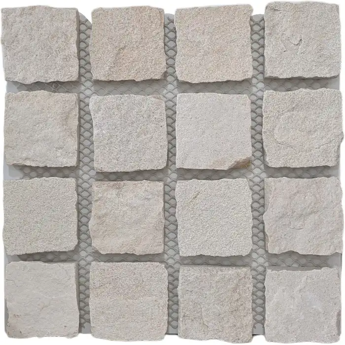 Close-up of White Sandstone cobblestone showing natural sandstone texture and rocky artisan edges