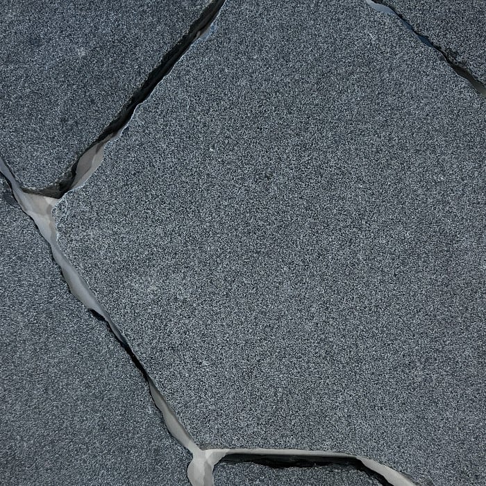 The Kaala shot blasted and tumbled crazy paver is characterised by its deep charcoal colour with fine flecks of pearl that lace throughout the stone. The bold, yet versatile colour makes it an ideal choice for both classical and modern projects.