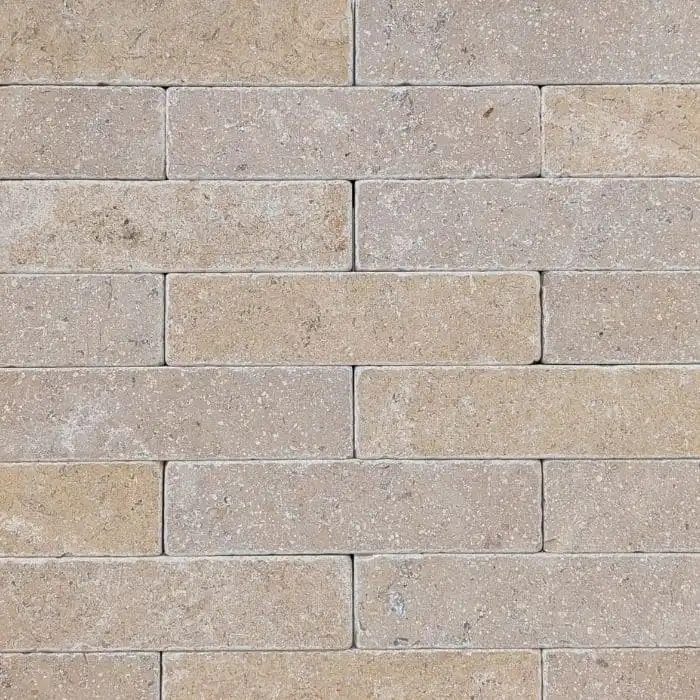 Sinai Pearl brushed and tumbled limestone batons in earthy beige and brown tones with natural quartz flecking